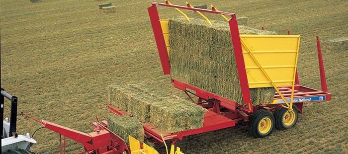 automatic-bale-wagons-clear-fields-of-bales-fast.jpg