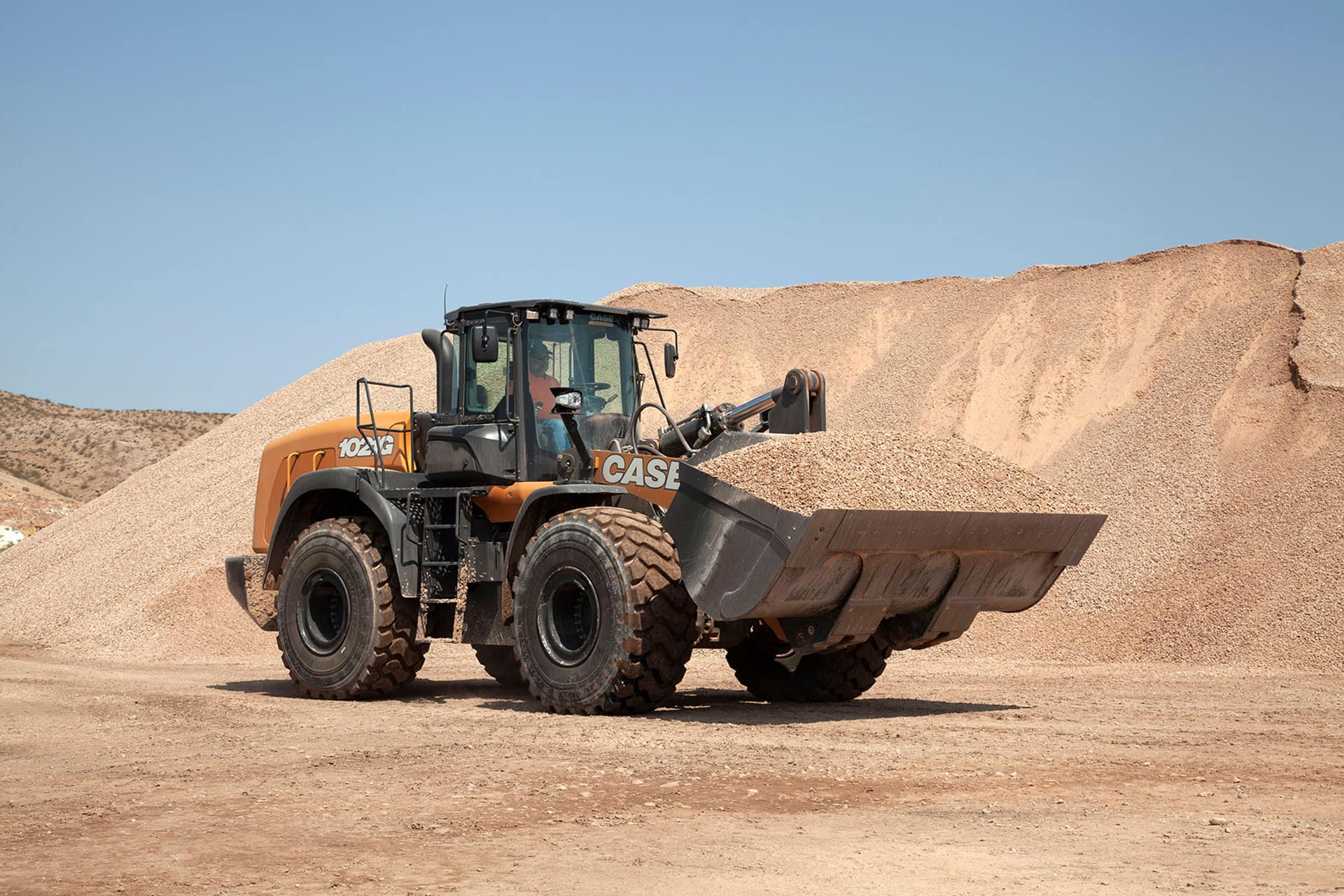 https://assets.cnhindustrial.com/casece/nafta/assets/Products/Wheel-Loaders/Full-Size-Wheel-Loaders/Enhanced-G-Series/Model-Images/1021G-Header-Image-Prepped.jpg?Width=800&Height=450