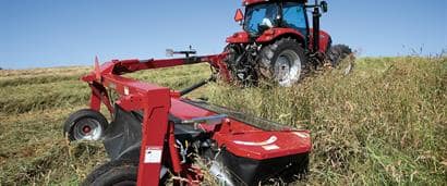 //assets.cnhindustrial.com/caseih/NAFTA/NAFTAASSETS/Products/Mowers-and-Conditioners/Pull-Type-Disc-Mowers/TD102/TD102_00307_03-09_mr.jpg?width=410&height=171