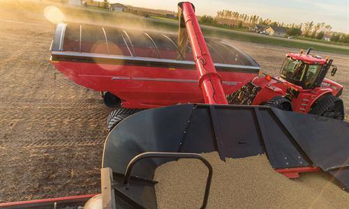Pivoting Auger Spout