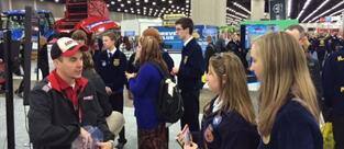 Handing out Steiger Keychains at the 2015 National FFA Expo