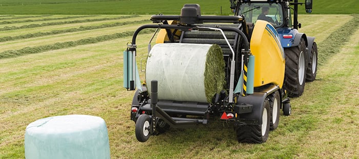 automatic-knife-retraction-for-a-smoother-bale-roll-baler.jpg